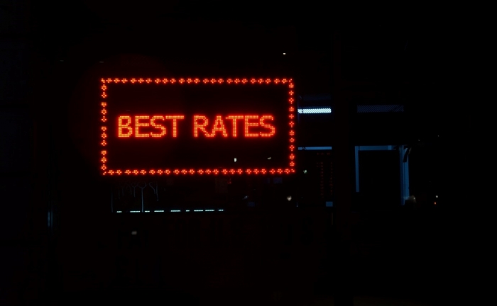 light up best rates text in a dark room